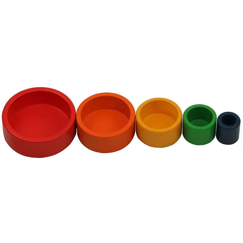 Montessori nesting and stacking bowls arranged by size from large to small for toddler sensorial size grading work