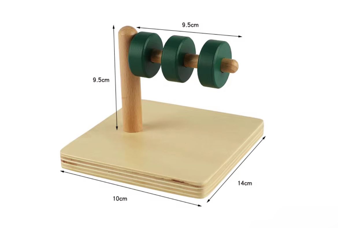 Montessori discs on horizontal dowel showing size dimensions for toddler fine motor coordination and controlled movement