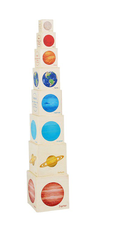 Tall vertical stack of solar system cubes illustrating relative planet sizes in a Montessori-style science activity