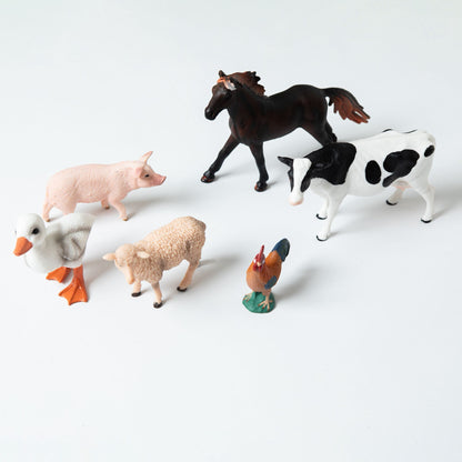 Set of realistic farm animal figurines including cow, horse, pig, sheep, duck and rooster for toddler learning