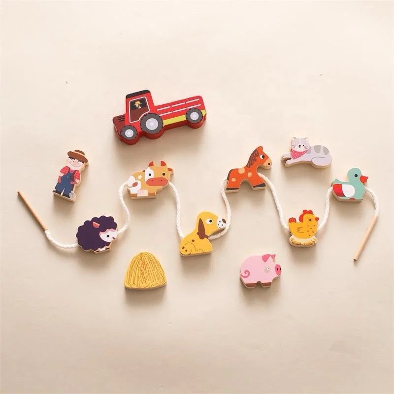 Farm themed wooden lacing activity with animals farmer and tractor pieces for toddler hand eye coordination