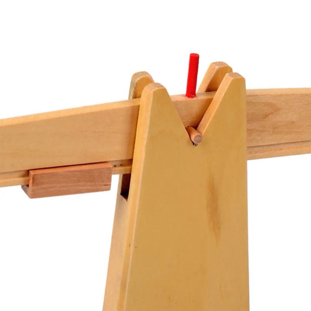 Close-up of center pivot mechanism of the Montessori wooden balancing scale.