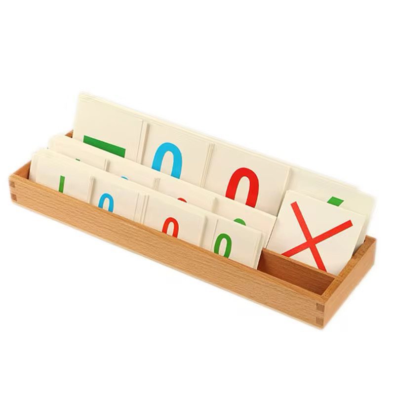 Wooden tray containing Montessori place value cards for units, tens, hundreds, and thousands used in the Bank Game.