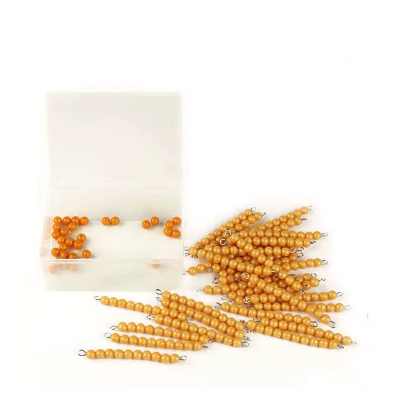 Montessori golden bead ten bars and loose unit beads used for decimal system and arithmetic activities.