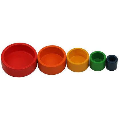 Montessori nesting and stacking bowls arranged by size from large to small for toddler sensorial size grading work