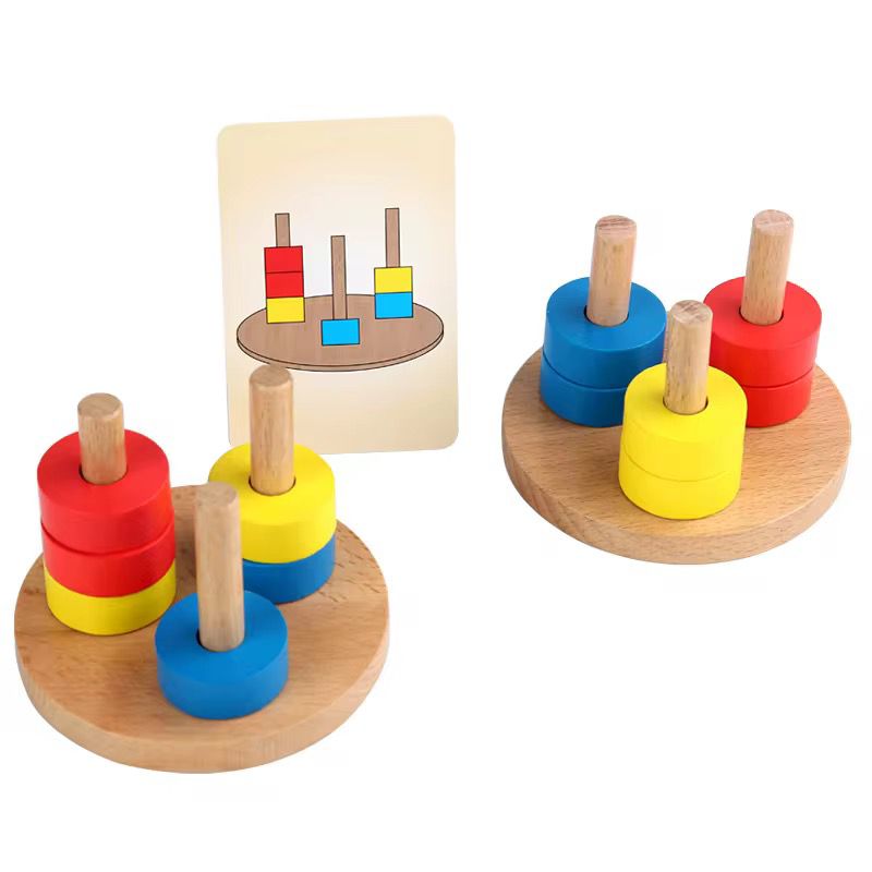 Montessori color stacking and matching activity showing two peg bases matched with visual control card