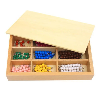 Wooden Montessori bead box with sliding lid partially closed, showing the colored bead bars stored inside.