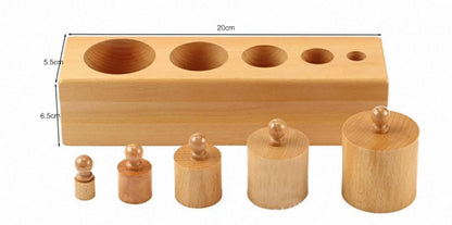Montessori wooden cylinder blocks showing size dimensions for toddler sensorial hand and visual discrimination