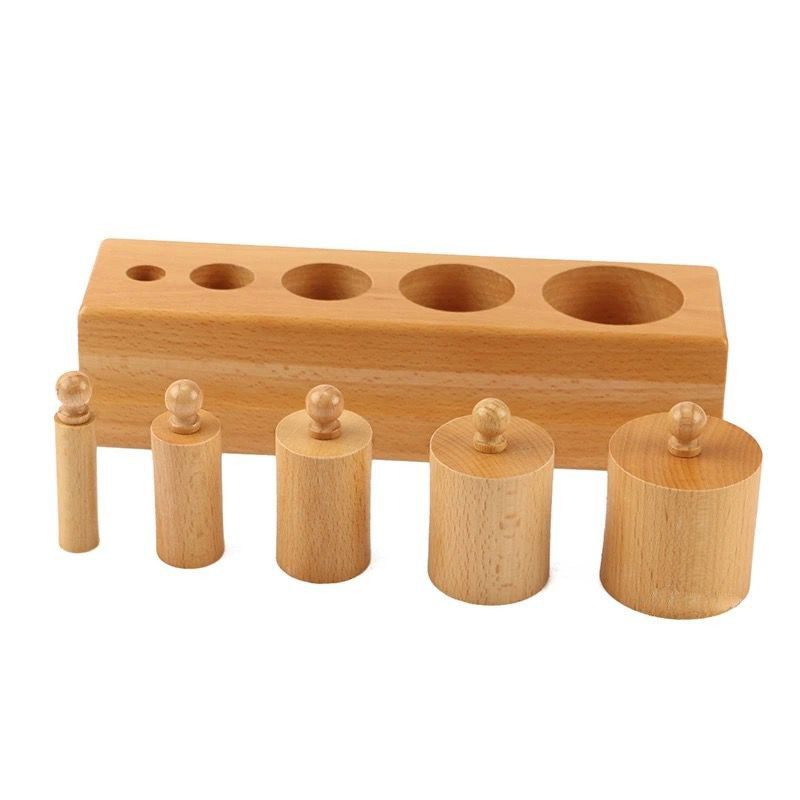 Montessori toddler cylinder blocks with increasing height for hand coordination and dimensional comparison work