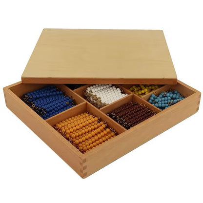 Wooden Montessori Decanomial Box shown with lid and organized bead compartments.