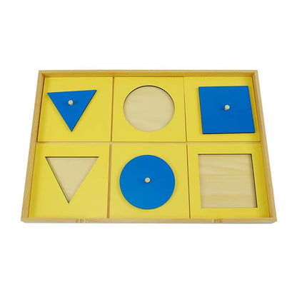 Complete Montessori geometric inset tray showing circle, triangle, and square shape pieces