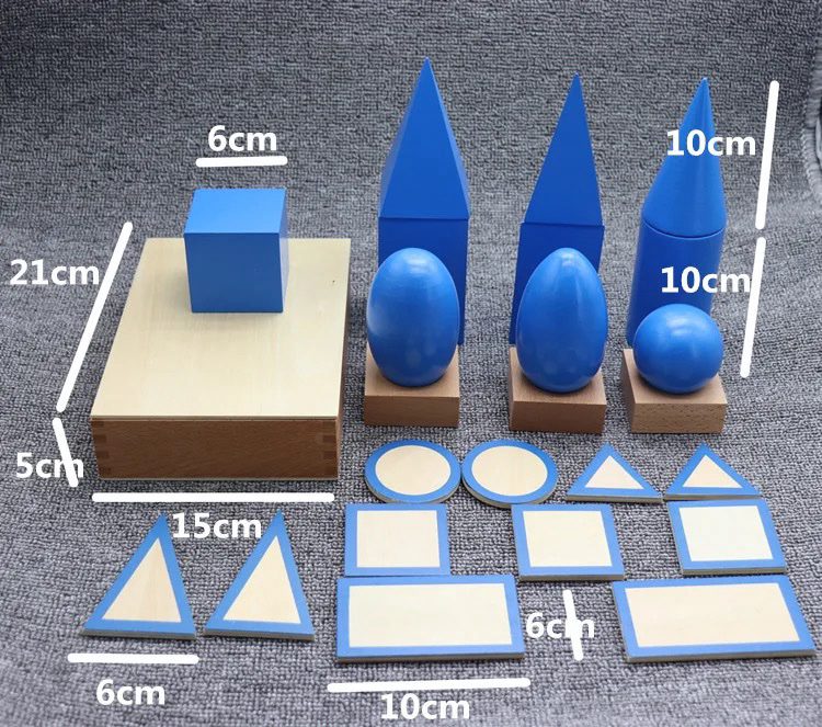 Complete Montessori geometric solids set with bases and cards, displayed with measurement labels for each component.