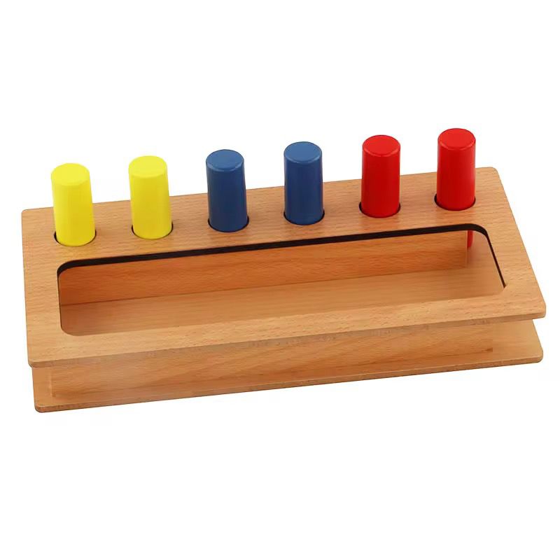 Montessori imbucare peg box with red blue and yellow pegs for toddler eye hand coordination and color matching