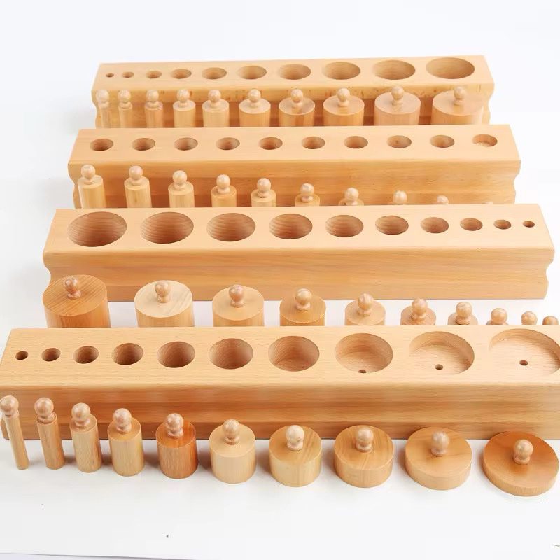 Top view of Montessori knobbed cylinder blocks showing graded cylinder variations