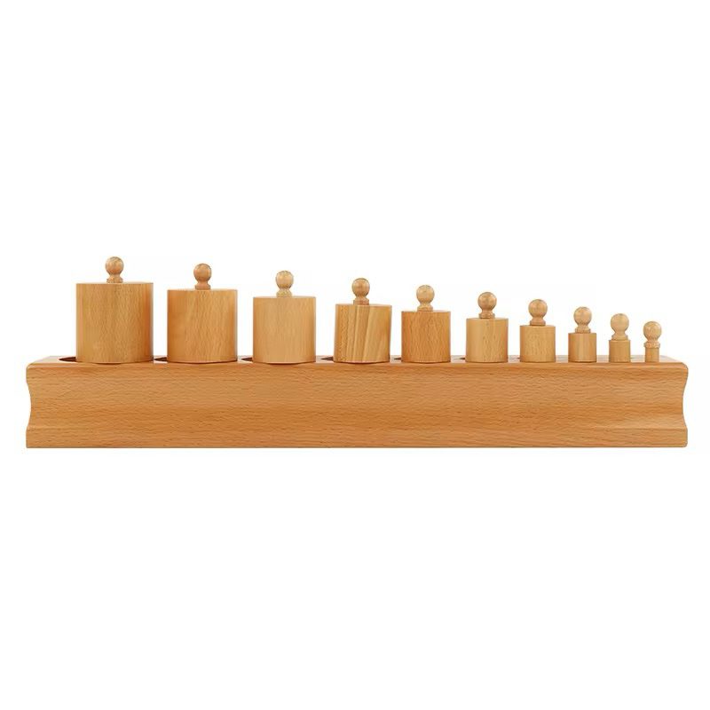 Montessori knobbed cylinder block featuring cylinders varying in both height and width