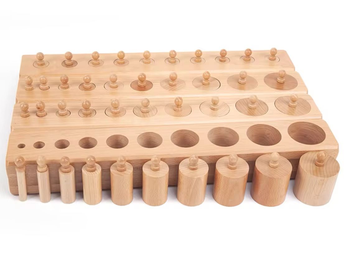 Montessori Knobbed Cylinders full set of four wooden blocks with varying cylinder sizes