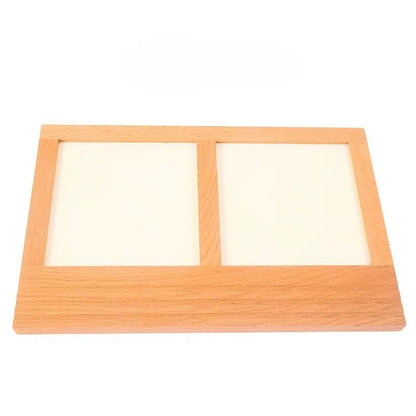 Wooden Montessori metal inset tracing tray with two rectangular slots for holding inset papers, designed for handwriting and fine motor practice.