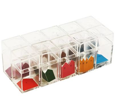 Montessori printed arrows for short bead chains stored in transparent boxes, showing color-coded numbered arrows used for counting and skip-counting activities.