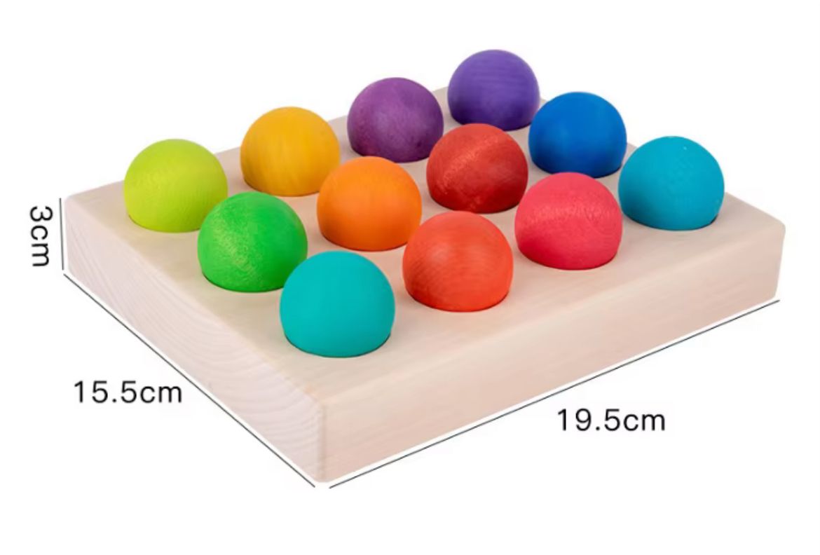Montessori wooden rainbow ball sorting game showing full board dimensions and ball size for toddler fine motor development