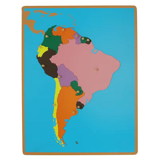 Wooden Montessori South America puzzle map showing individual countries with color-coded pieces on a blue background