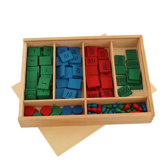 Montessori Stamp Game complete set with wooden tiles, skittles, and counters arranged in a compartmentalized wooden box