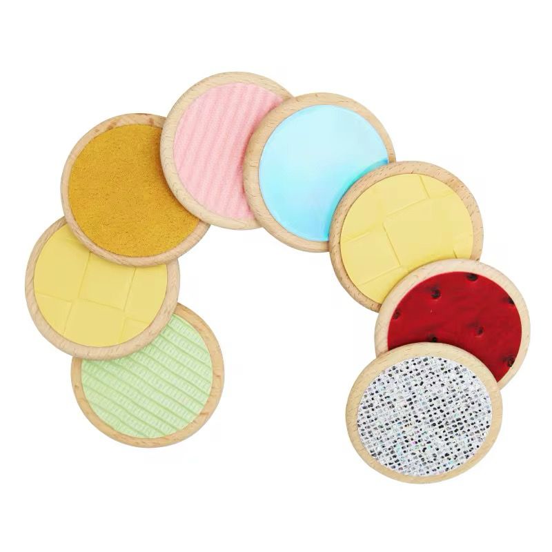 Set of round Montessori sensory texture discs for touch and feel activity