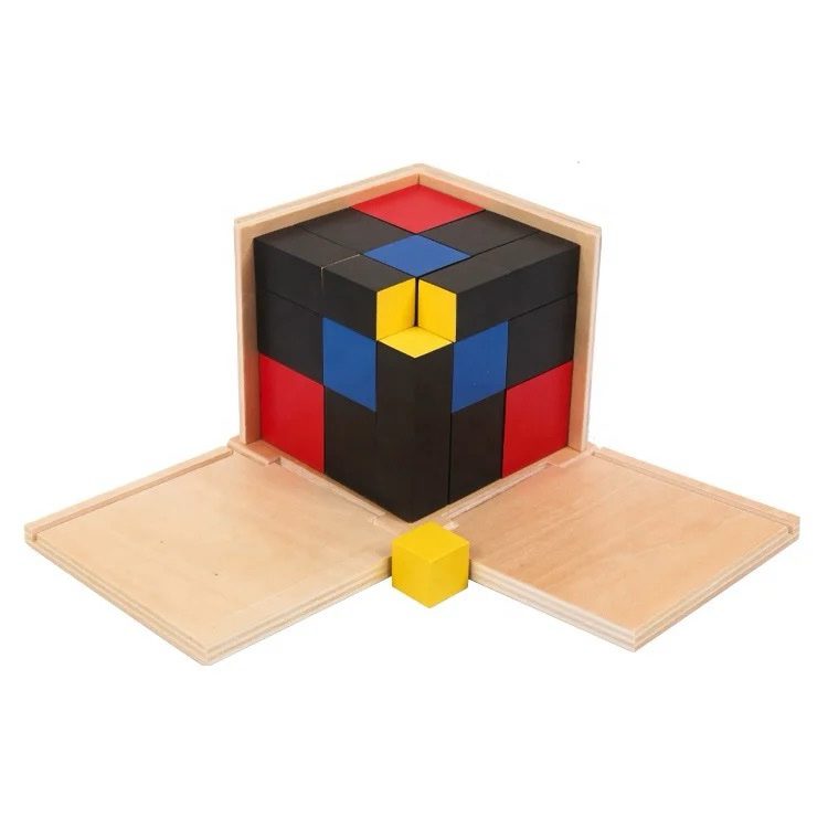 Montessori Trinomial Cube displayed in an open wooden box with colorful blocks arranged in a cube.