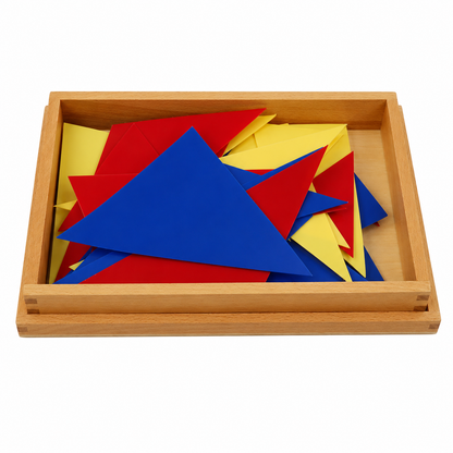 Educational wooden tray containing layered geometric triangle shapes in primary colors for learning activities.