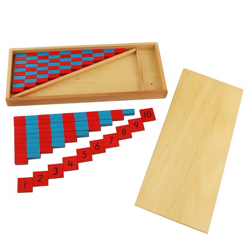 Montessori number rods arranged outside the wooden tray along with labeled number tiles from 1 to 10.