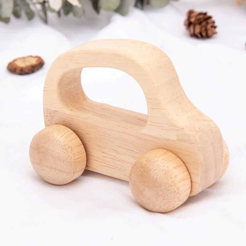 Natural wooden car toy with smooth wheels for toddler pushing activity and gross motor coordination