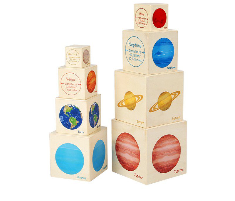 Solar system stacking cubes arranged in towers to compare planet sizes from Mercury to Neptune for visual learning