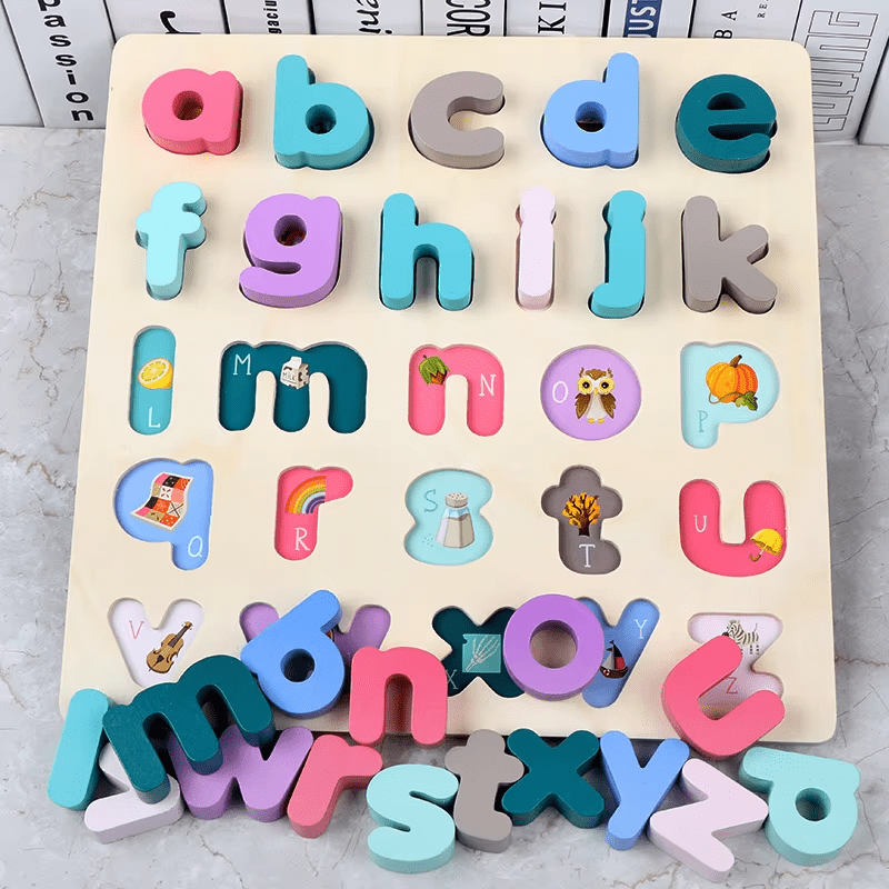 Lowercase wooden alphabet puzzle board displayed on a table with letters and phonics picture clues