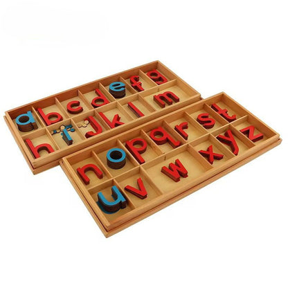 Red and blue wooden lowercase movable alphabet letters arranged in wooden storage trays.