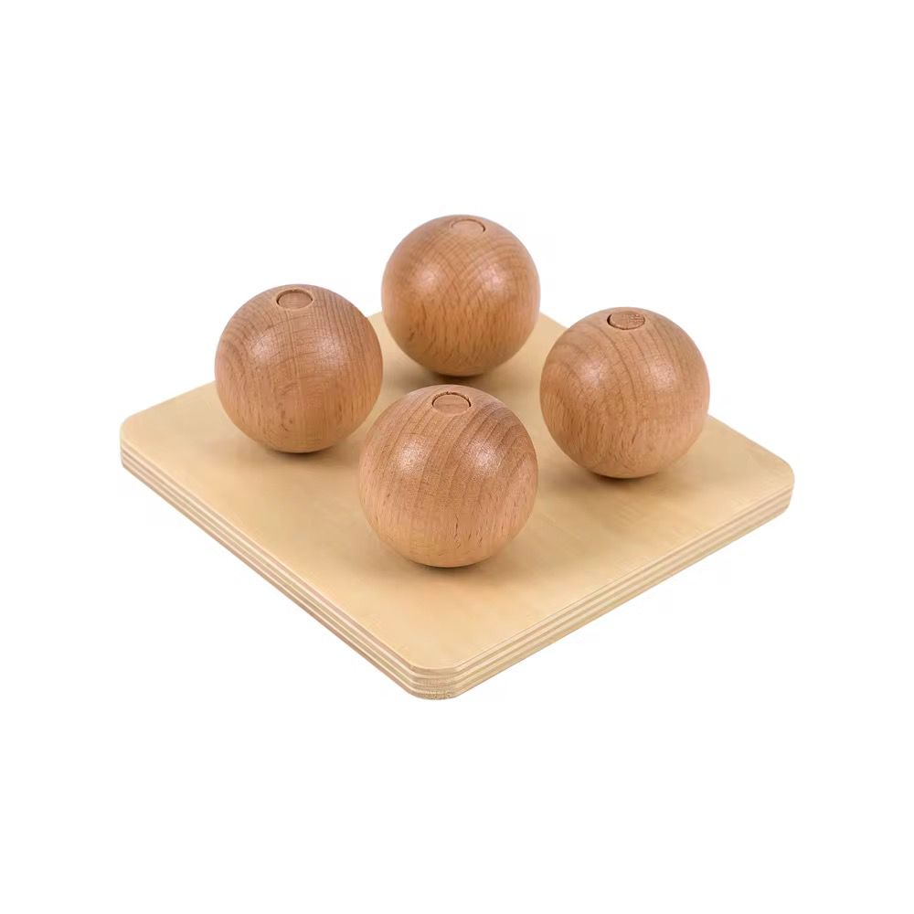 Montessori balls on small pegs infant toddler fine motor activity