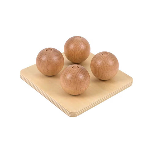 Montessori balls on small pegs infant toddler fine motor activity