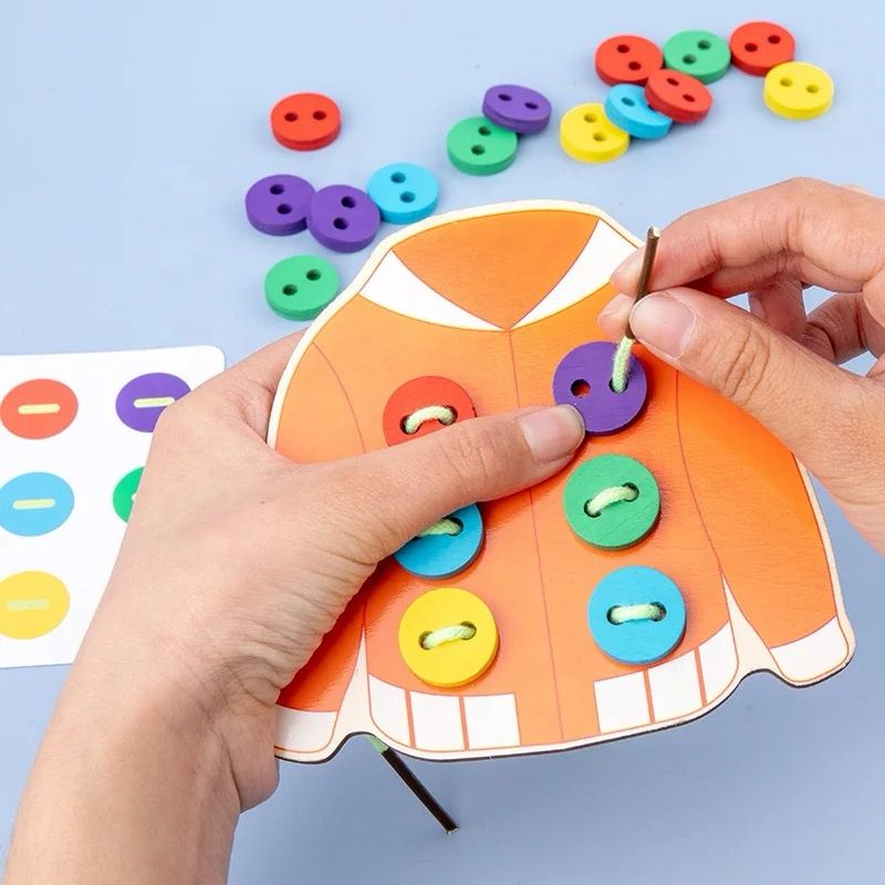 Hands-on button matching activity helping children practice finger strength and hand coordination