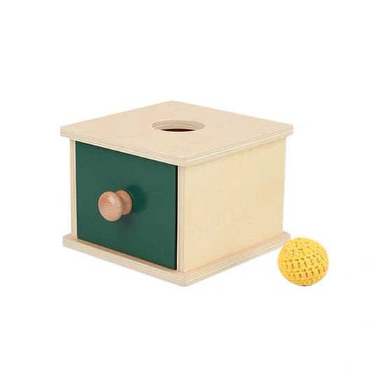 Montessori imbucare box with knitted ball  