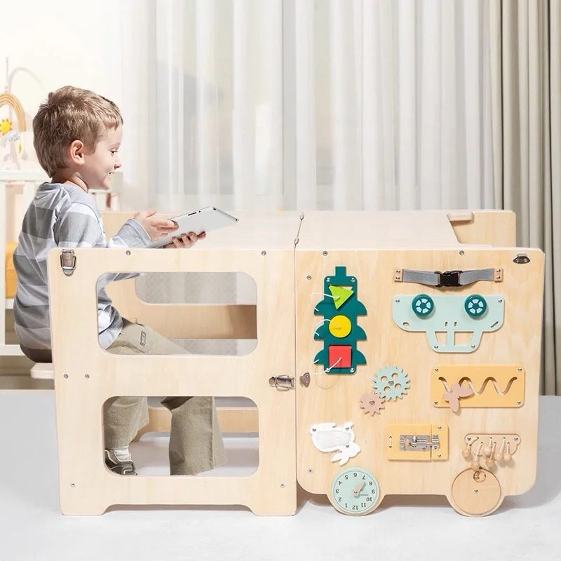 Convertible learning tower featuring built-in activity board with gears, shapes, and educational elements for toddlers