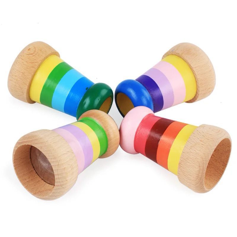 Mini wooden kaleidoscope with colorful bands designed as a visual sensory toy for kids