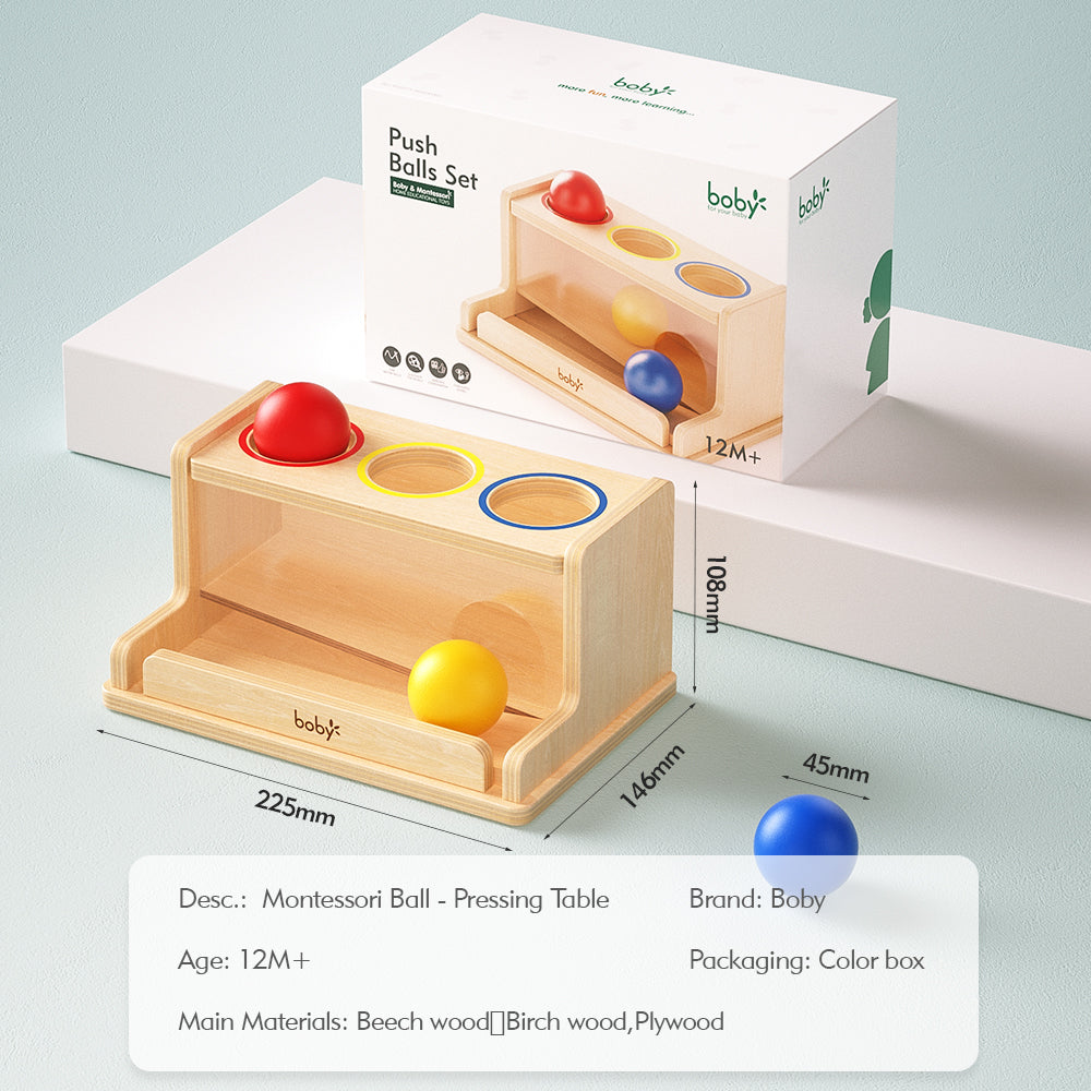 Angled view of a Montessori wooden ball drop box featuring colorful balls and matching openings, encouraging grasping, color matching, problem-solving, and early cognitive development for young children.