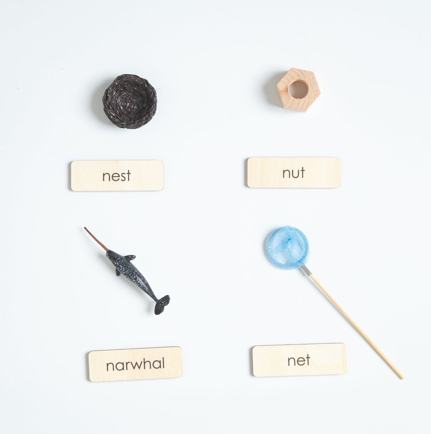 Montessori beginning sound objects for letters M to P with realistic miniatures