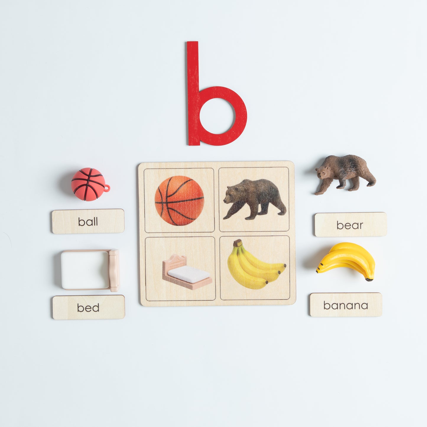 Montessori beginning sounds object tray for hands-on phonics practice