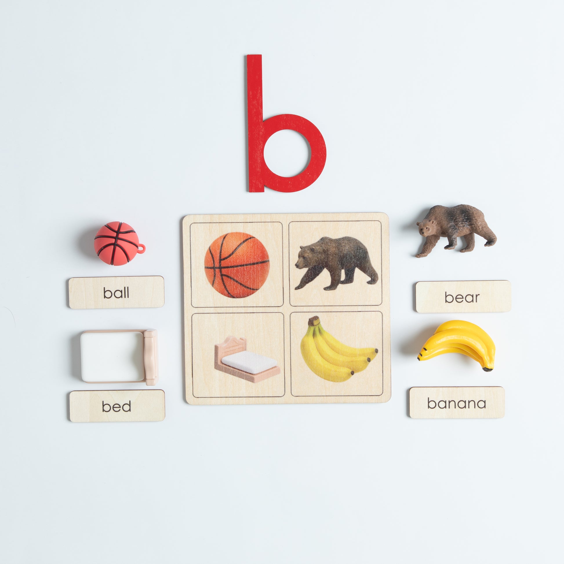 Montessori beginning sounds object tray for hands-on phonics practice
