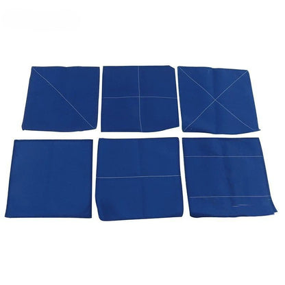 Set of six Montessori folding cloths with stitched guide lines for practical life activities