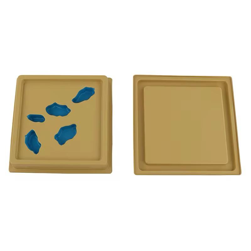 Montessori land and water forms set 1 including island, lake, peninsula, and gulf trays