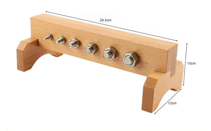 Montessori nuts and bolts assembly activity designed to improve hand strength, coordination, and concentration