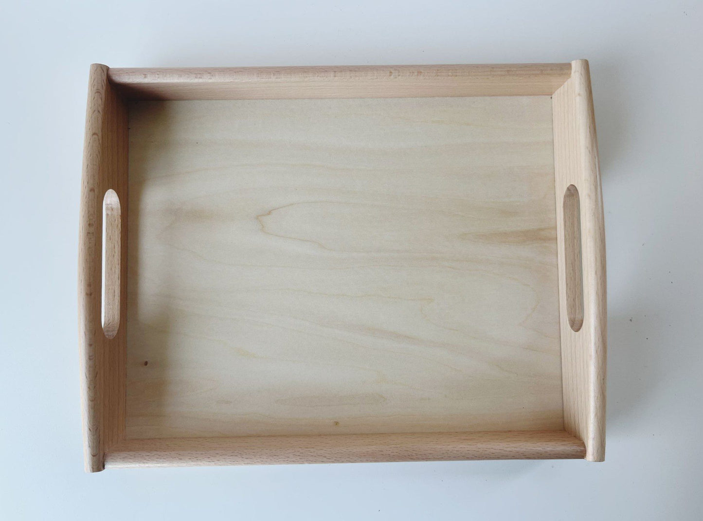 Top view of Montessori wooden practical life activity tray