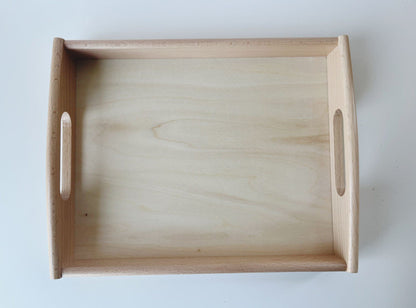 Top view of Montessori wooden practical life activity tray
