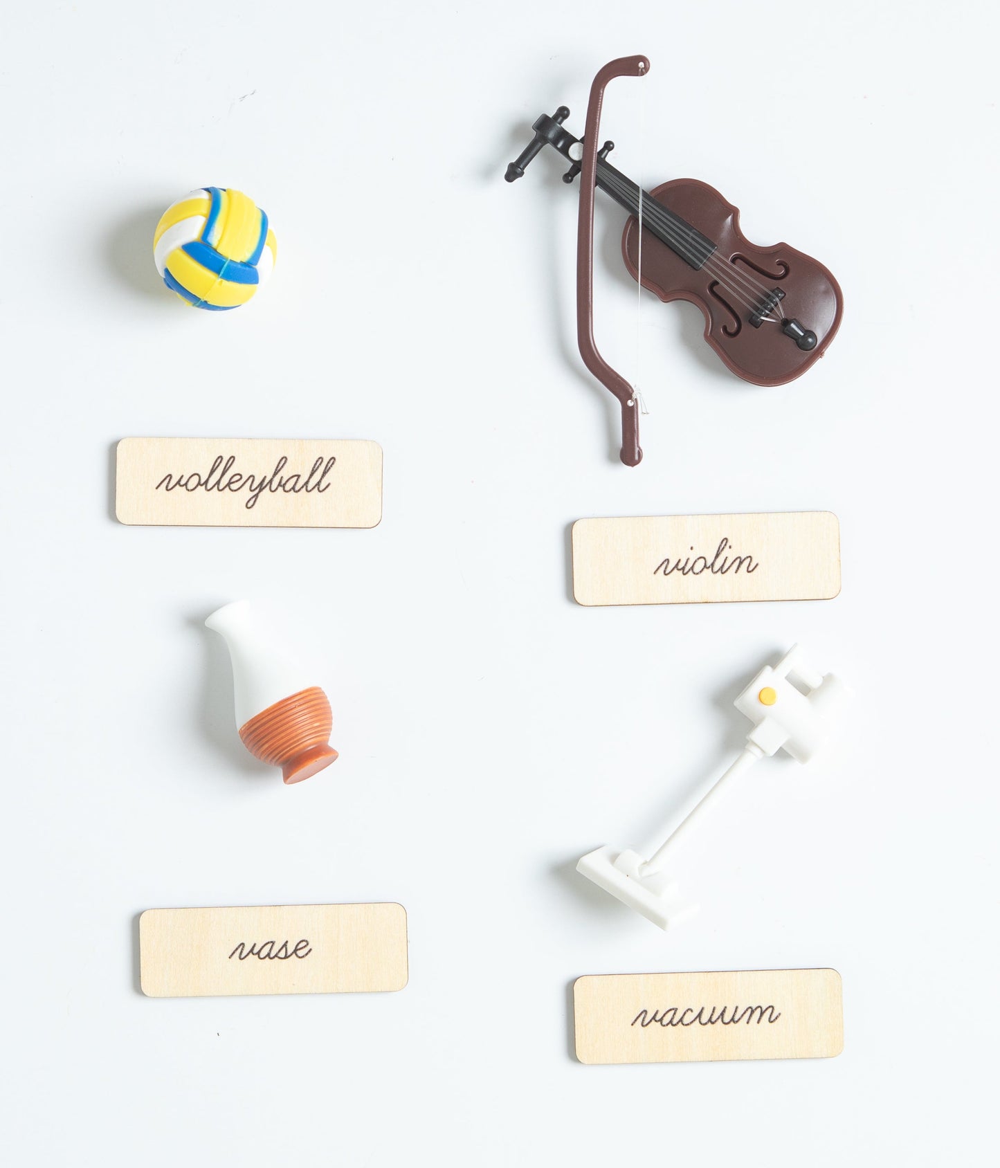 Montessori sound box objects for letters A to D with realistic miniatures