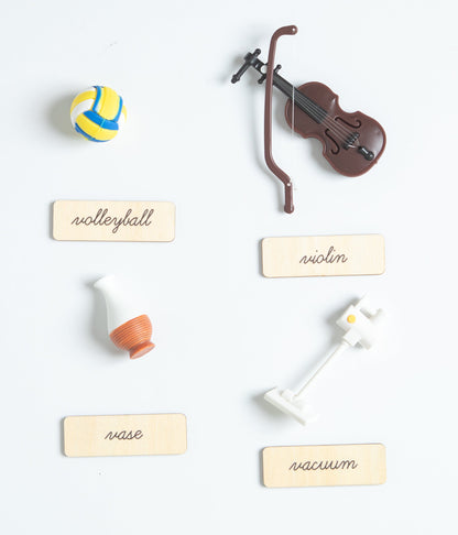 Montessori sound box objects for letters A to D with realistic miniatures